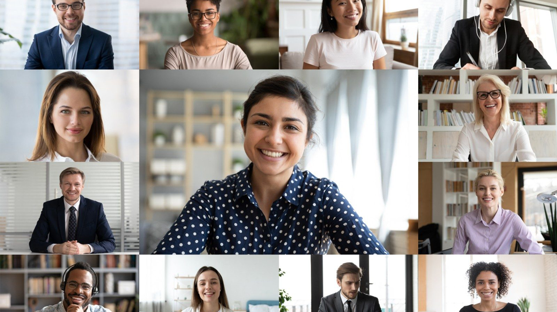 Separate people each smiling towards camera